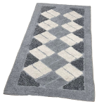 Dywan "Grey Diamond Mosaic Rug", 70x140 cm. Szary dywan zdobiony kremowymi prostokątami i ciemniejszymi szarymi trójkątami w narożnikach. Dywan "Grey Diamond Mosaic Rug", 70x140 cm. Szary dywan zdobiony kremowymi prostokątami i ciemniejszymi szarymi trójkątami w narożnikach.
