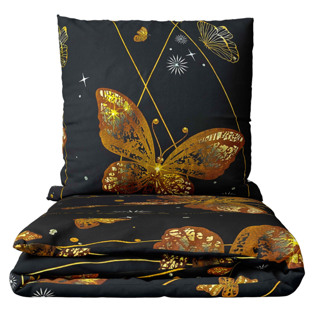 Komplet pościeli "Flutter". Komplety pościeli 140x200, 140x200 cm, 200x200 cm, 200x220 cm, 220x240 cm. Odważna czarna pościel ozdobiona żywymi pomarańczowymi motylami i kapryśnymi migotaniami.