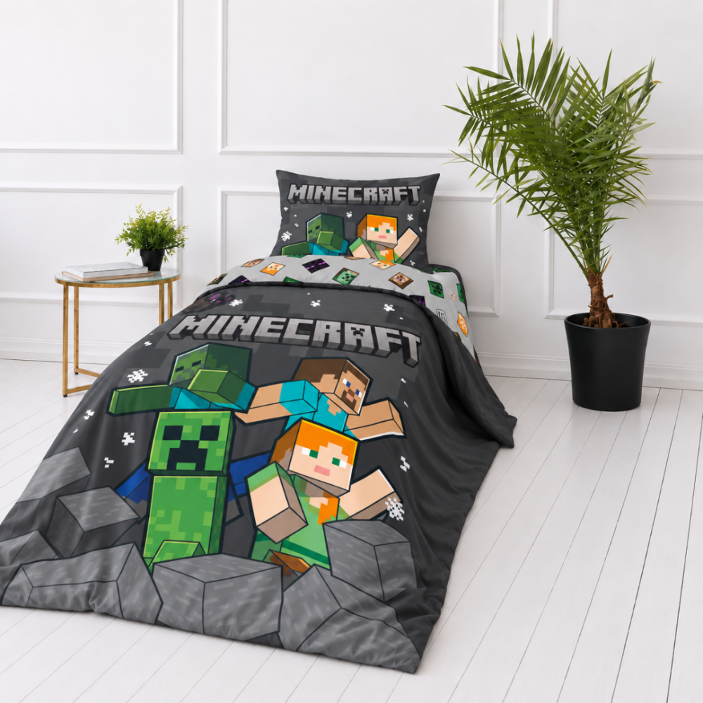 Pościel bawełniana „Minecraft“. Pościel bawełniana, 135x200 cm. Czarno-szara pościel z napisem minecraft oraz turkusowymi i pomarańczowymi akcentami.