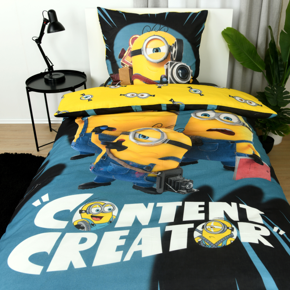 Pościel bawełniana „Minions“. Pościel bawełniana, 135x200 cm. Czarno-niebieski wzór minions z żółtymi postaciami minionków Pościel bawełniana „Minions“. Pościel bawełniana, 135x200 cm. Czarno-niebieski wzór minions z żółtymi postaciami minionków